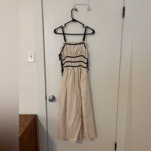 Elegant Cream Maxi Dress with Black Accents